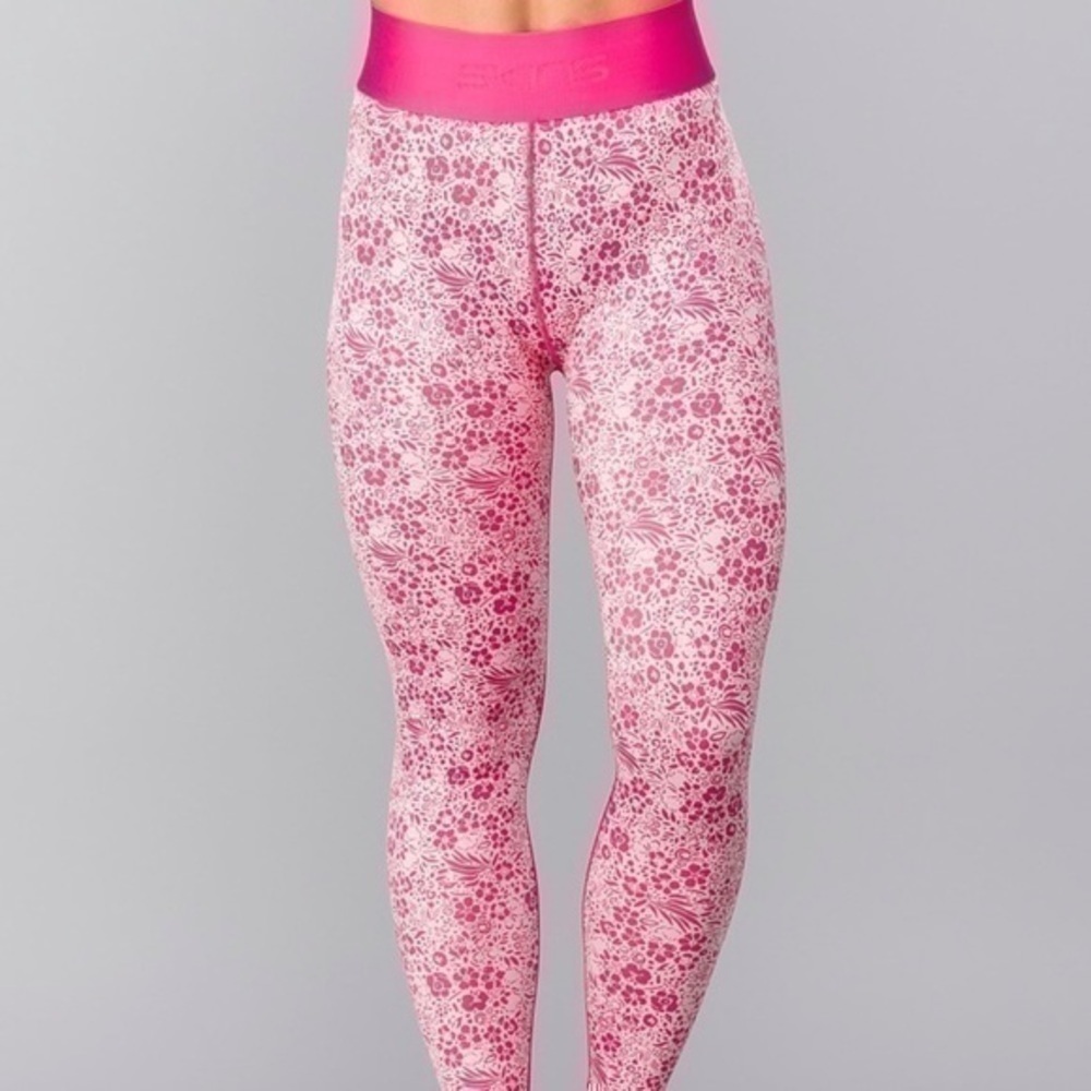 SKINS Pro Performance DNAmic Primary Compression Tights Floral gently preloved - Picture 9 of 14
